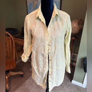 Woman’s very lightweight button down shirt.